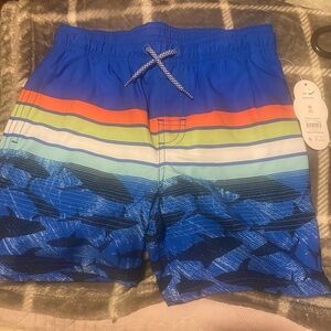 Boys blue shark swim trunks NWT